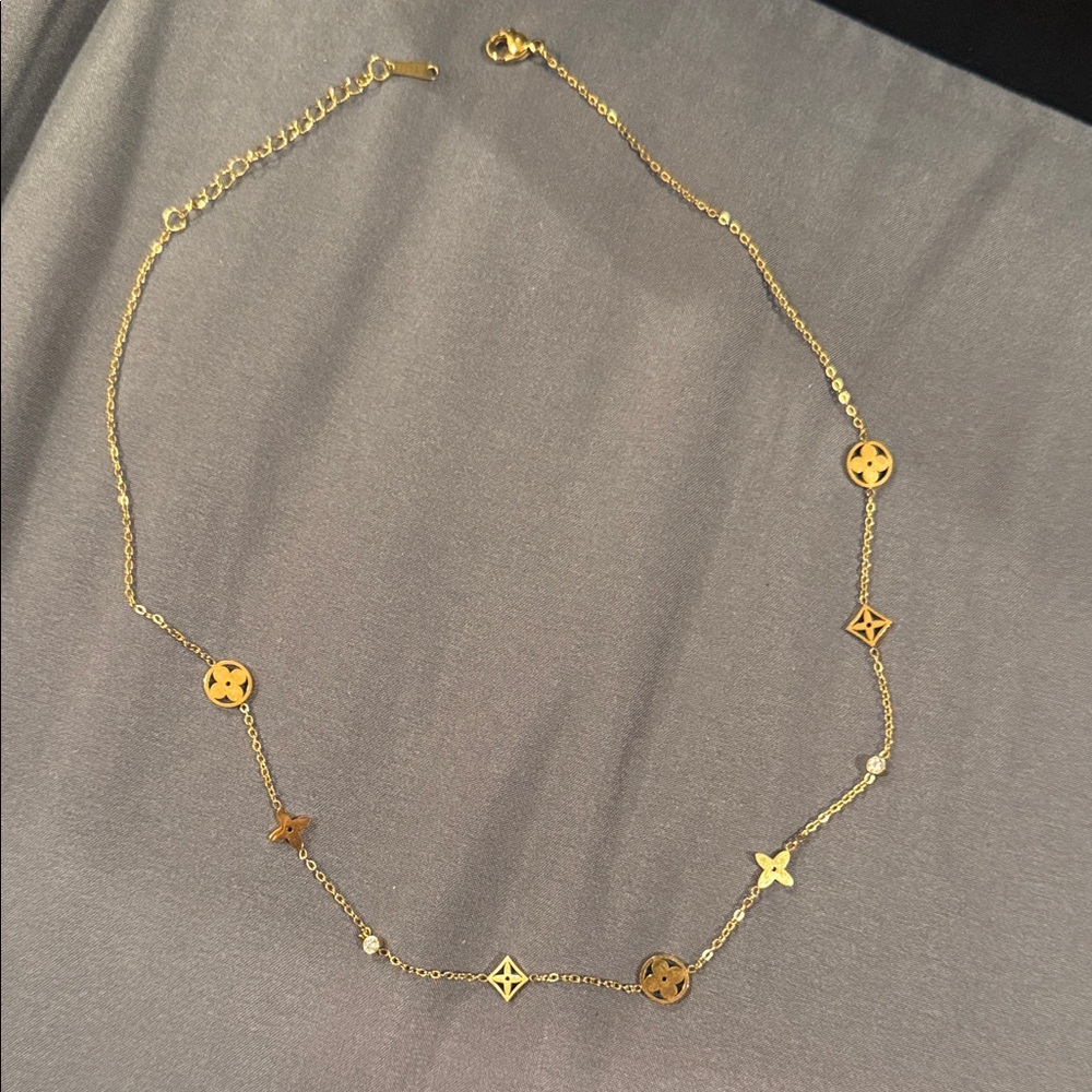 Gold Designer Charm Necklace